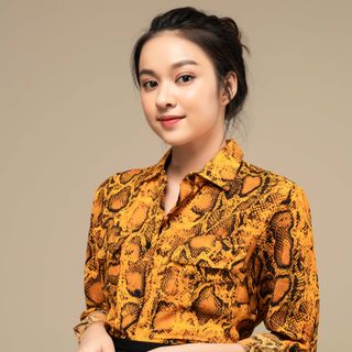 Áo sơ mi nữ da báo màu vàng