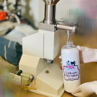 Ủ sữa non kích trắng chai 1000ml