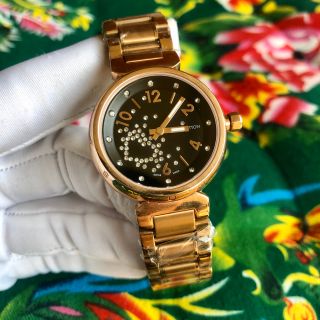 Đồng hồ L.V. vỏ vàng mặt đen