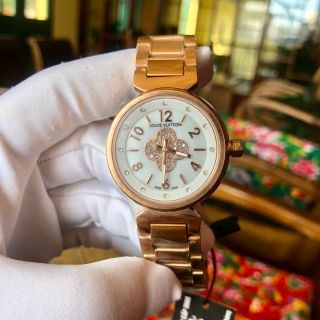 Đồng hồ L.V. vỏ vàng mặt số hoa đá