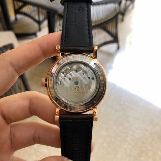 Đồng hồ nam Patek Philipe vỏ vàng mặt đen