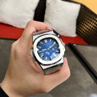 Đồng hồ Patek Philipe vỏ trắng mặt xanh