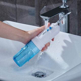 Máy Tăm Nước IRIS Waterpick(Himaly) Phiên Bản Mới 4 Chế Độ