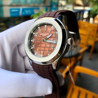 Đồng hồ Patek Philipe Vỏ trắng mặt nâu đỏ