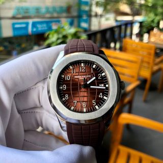 Đồng hồ Patek Philipe Vỏ trắng mặt nâu đỏ