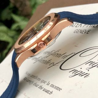 Đồng hồ Patek Philipe Vỏ vàng mặt xanh