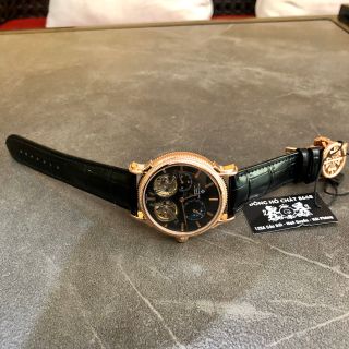 Đồng hồ nam Patek Philippe vỏ vàng mặt đen lộ cơ