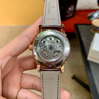 Đồng hồ Patek Philipe nam vỏ vàng mặt trắng lộ cơ