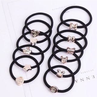 Dây cột tóc đen mặt nhựa vàng