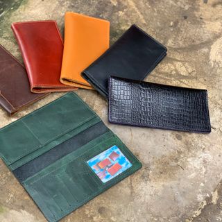 ví cầm tay unisex(100% da bò )