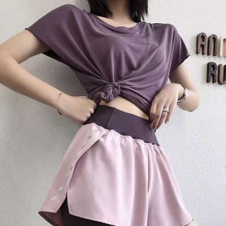 Quần tập đùi xẻ dạ quang