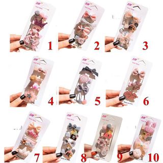 Một bộ sản phẩm dành cho bé yêu của bạn(gồm:sét 18 chi tiết+sét dây buộc tóc hình thú+1 băng đô +sét thiết kế 4 chi tiết)
