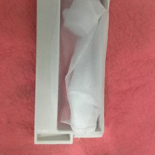 Lưới lọc rác bên trong máy giặt