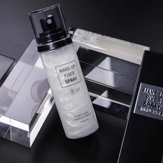 XỊT KHÓA NỀN GIỮ CHẶT LỚP TRANG ĐIỂM
