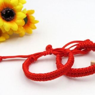 Vòng tay dây rút đỏ