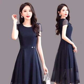 ĐẦM XOÈ XANH ĐEN ĐÍNH NÚT - DT1332