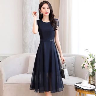 ĐẦM XOÈ XANH ĐEN ĐÍNH NÚT - DT1332