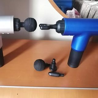 Máy massage cầm tay 4 đầu 6 chế độ Fascial Gun trị nhức mỏi mai gáy, đau nhức căng cơ