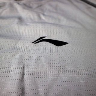 Bộ quần áo thể thao nam Li-ning chất lỗ kim