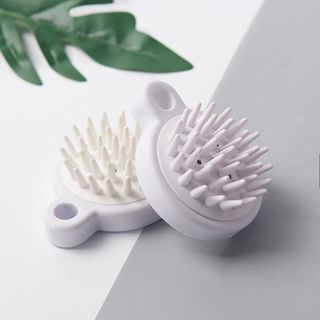 Lược gội đầu kích thích mọc tóc
