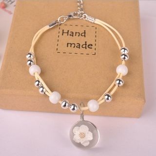 Vòng tay ép hoa khô đủ màu 20k