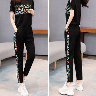 Bộ đồ thể thao nữ họa tiết TT01