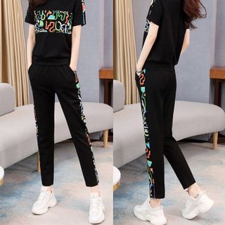 Bộ đồ thể thao nữ họa tiết TT01