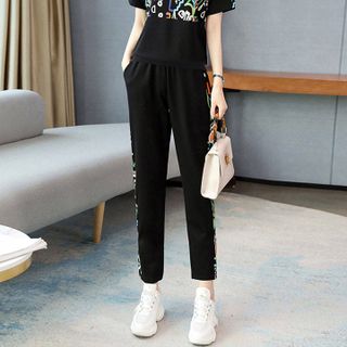 Bộ đồ thể thao nữ họa tiết TT01