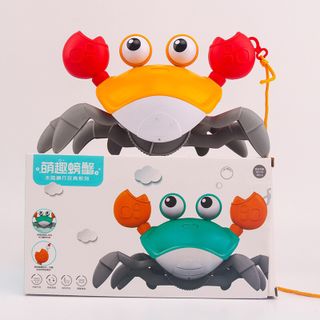 Cua đi biển đồ chơi