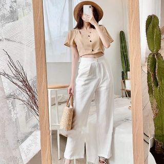Set áo tay cánh tiên và quần suông trắng