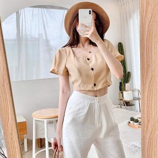 Set áo tay cánh tiên và quần suông trắng