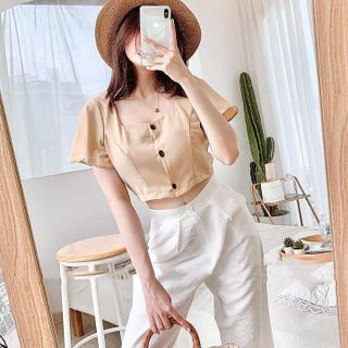 Set áo tay cánh tiên và quần suông trắng