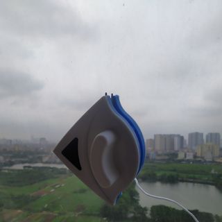 Bộ lau kính 2 mặt hút nam châm