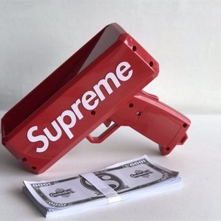 Đồ Chơi Súng Bắn Tiền Suprme Full Box Tặng Kèm 100 Tờ Tiền Dolar Suprme