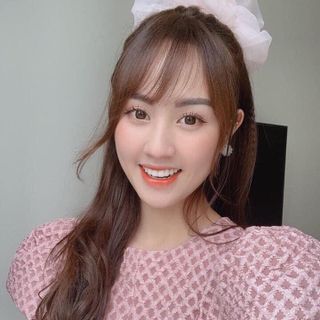 Đầm gấm tay phồng