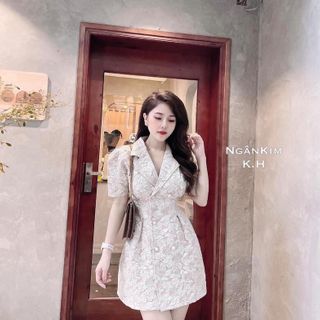 Đầm gấm nút