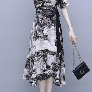 ĐẦM XOÈ HOẠ TIẾT DÂY NƠ ĐEN - DT1384 - chuyên sỉ thời trang nữ giá gốc