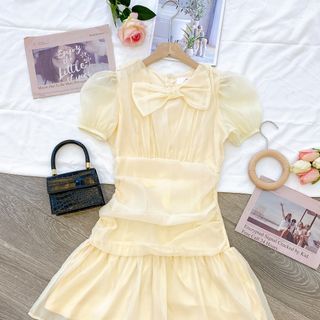 Đầm voan hồng vàng nơ cổ tay phồng