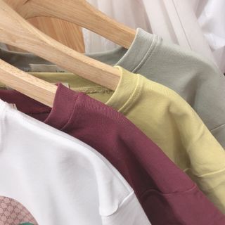Áo thun fom rộng dấu quần Qc