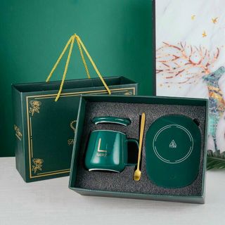 CỐC SỨ TỰ HÂM NÓNG KÈM ĐẾ ĐIỆN VÀ THÌA MẠ VÀNG