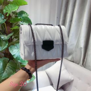 Túi nữ khoá vát đen trần chỉ
