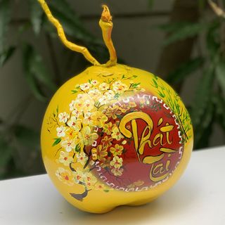 Dừa vẽ thư pháp chưng tết