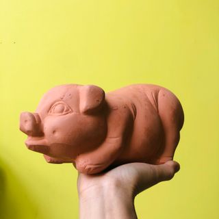 Heo đất dạng thô chưa tô vẽ hình heo mọi