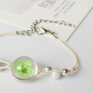 Vòng đeo tay mặt đá ép hoa khô. Giá sỉ 17k bao gồm dây và mặt