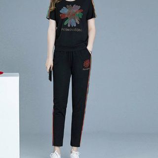 Đồ bộ thể thao hoa cúc đính đá TT463