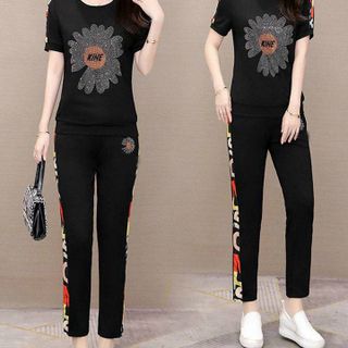 Đồ bộ thể thao hoa cúc đính đá TT463