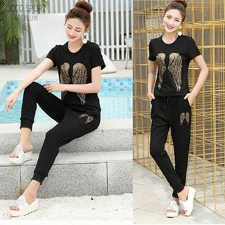 Đồ bộ thể thao hoa cúc đính đá TT459