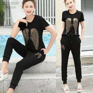 Đồ bộ thể thao hoa cúc đính đá TT459