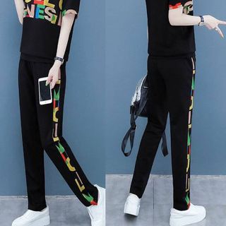 Đồ bộ thể thao cổ bẻ phối chữ TT432180