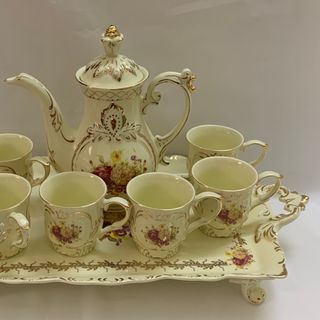 Bộ bình trà sứ phong cách hoàng gia cổ điển màu trắng ngà họa tiết hoa cúc